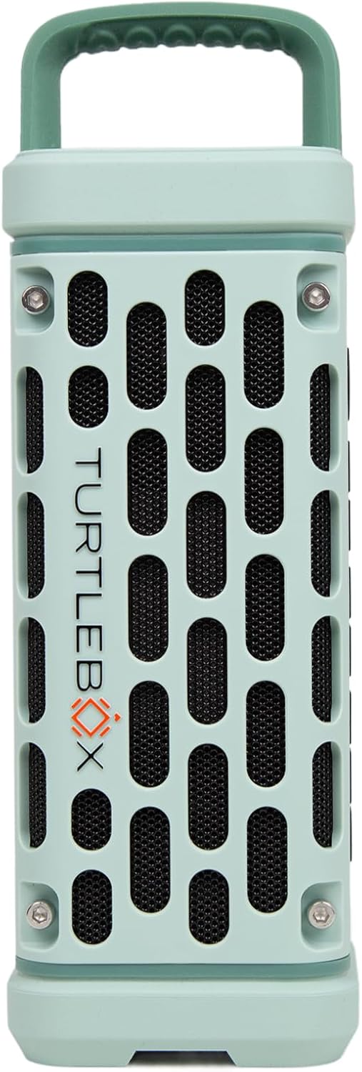 {{color}} rugged portable Bluetooth speaker with waterproof and shockproof design, shown in outdoor adventure setting โ view 1