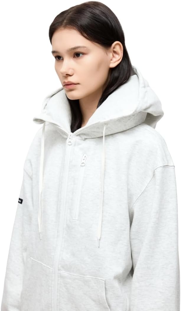 Travel hoodie with built-in inflatable neck pillow in [color], shown inflated for neck support — view 1