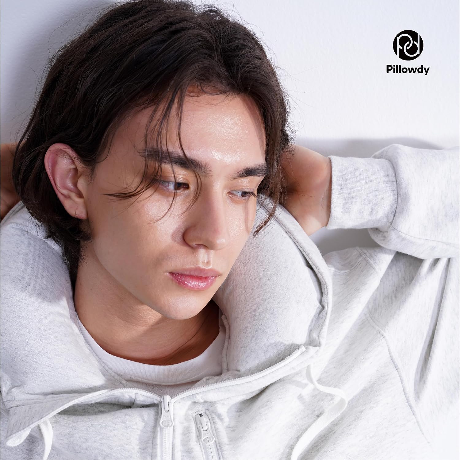Travel hoodie with built-in inflatable neck pillow in [color], shown inflated for neck support — view 2