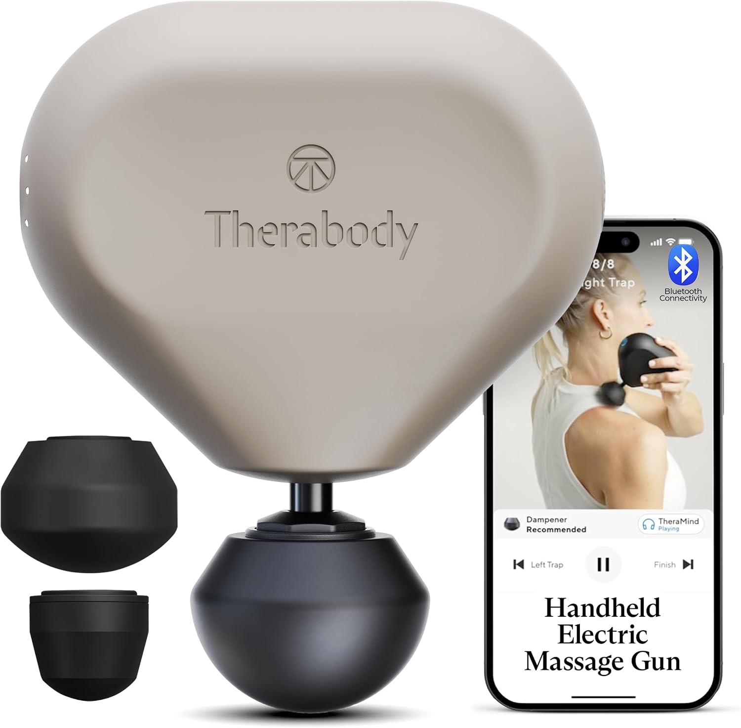 [Color] compact portable massage gun with aluminum body and silicone grip, displayed on travel luggage — view 1