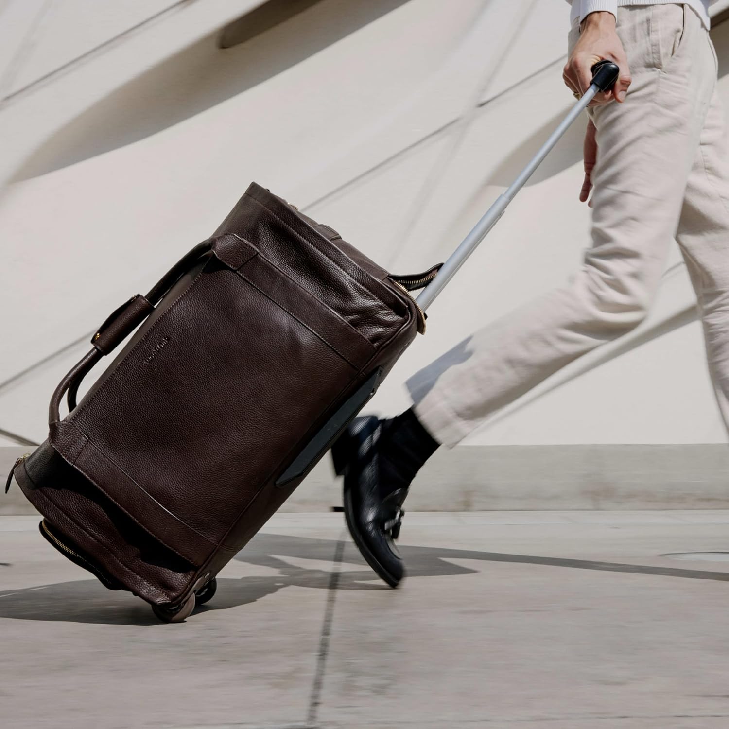 [Color] wool blend duffle bag with leather trim, wheeled base, and visible shoe compartment — view 4
