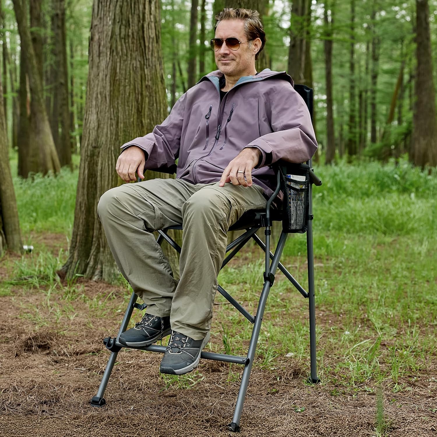 Tall bar height camping chair in black textilene mesh with aluminum frame, armrests, and footrest โ view 4