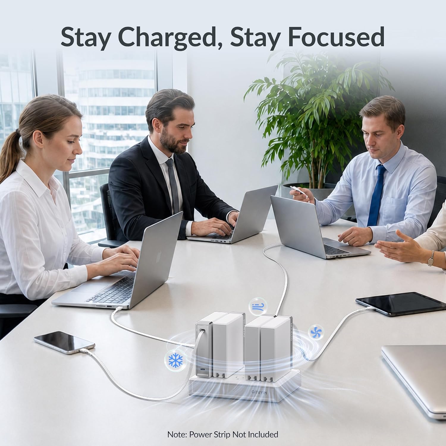 [Color] compact 140W retractable laptop charger with dual USB-C ports and coiled cable, displayed with MacBook and iPhone — view 4