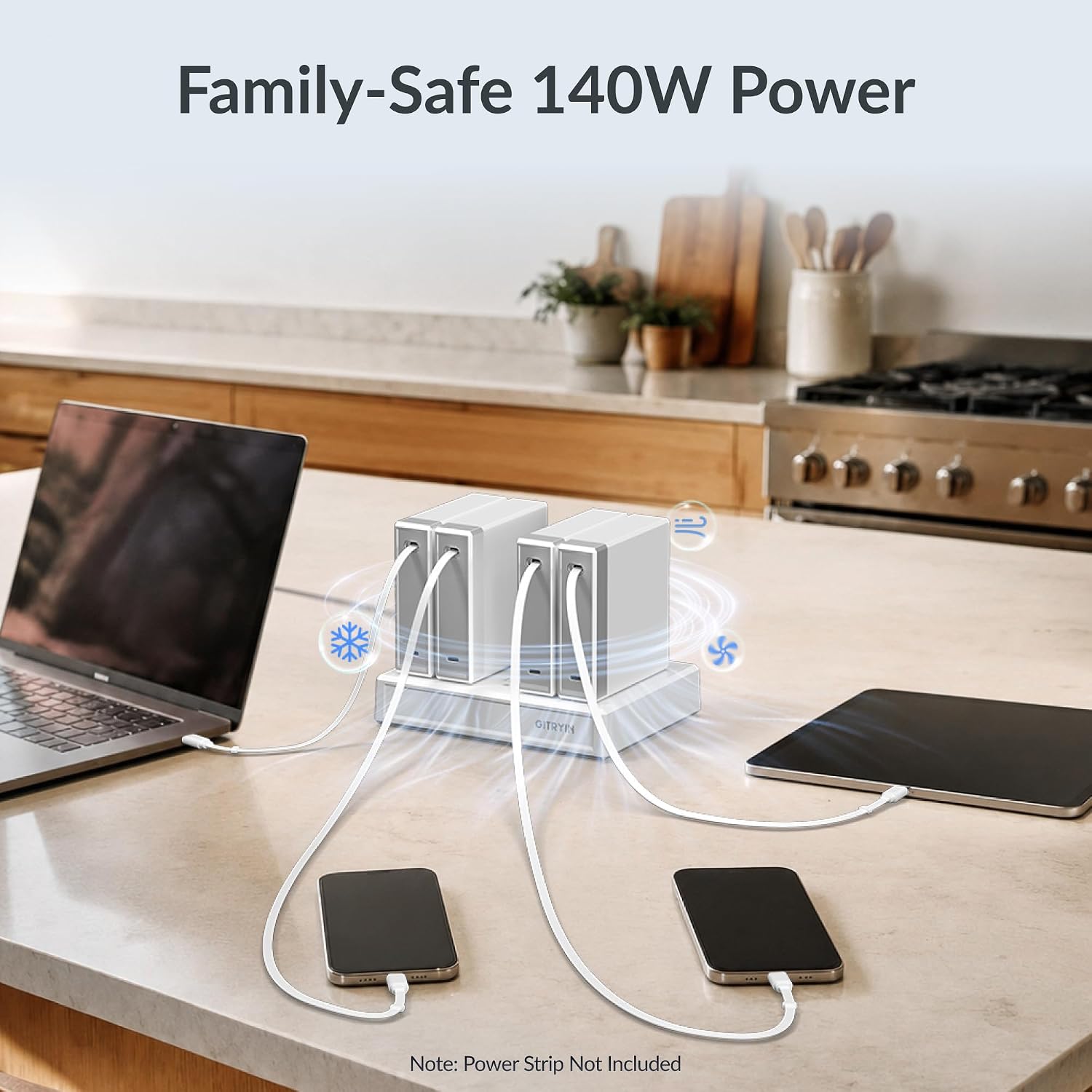[Color] compact 140W retractable laptop charger with dual USB-C ports and coiled cable, displayed with MacBook and iPhone — view 2