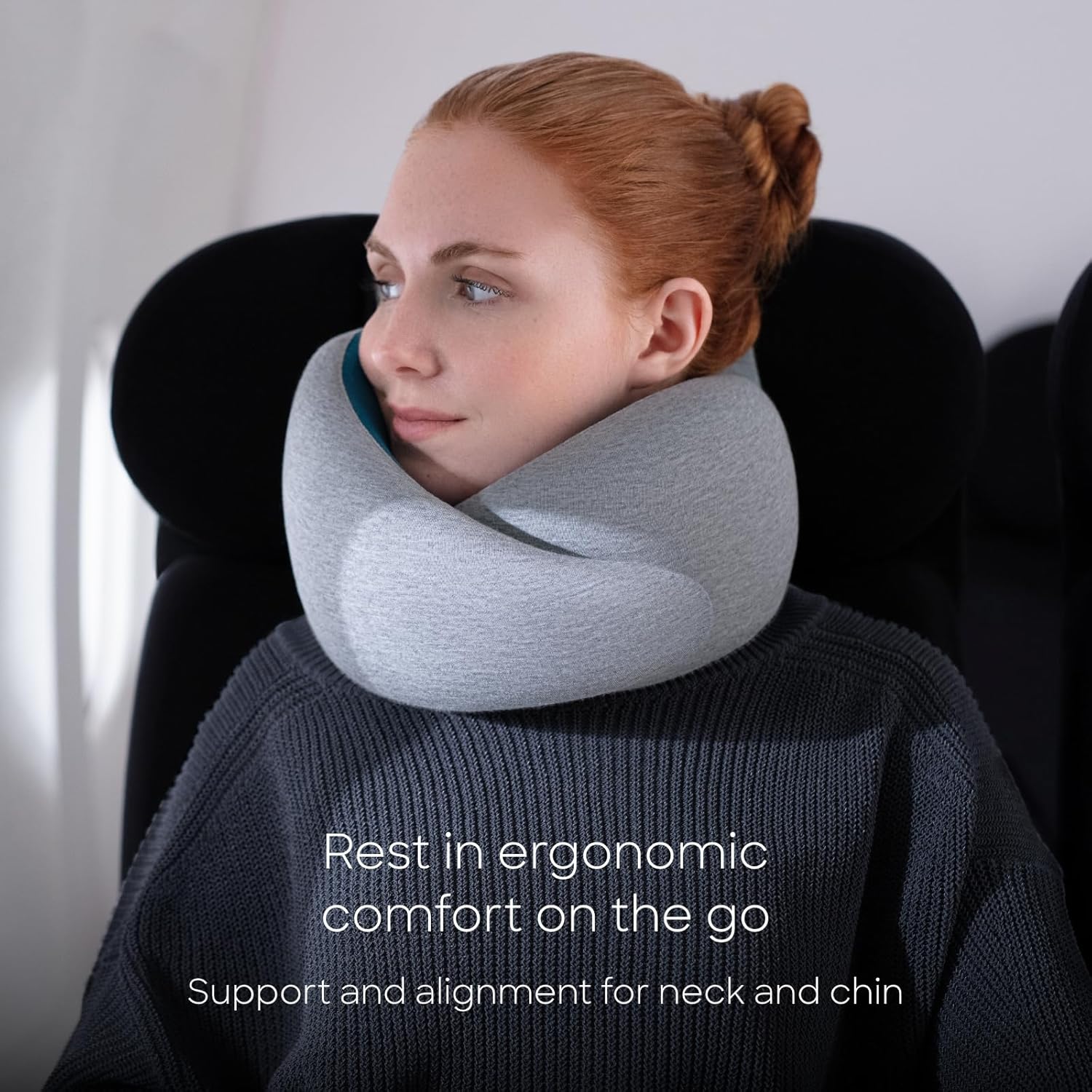 [Color] memory foam neck pillow with 360-degree support and asymmetrical design, shown with included travel bag — view 2